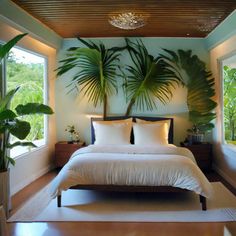 a bed sitting in a bedroom next to two windows with potted plants on the wall