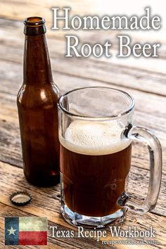 homemade root beer in a glass mug next to a bottle