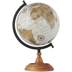 an old world globe on a wooden stand with a black metal ring around the base