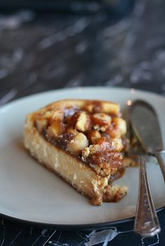 a piece of pie on a plate with a fork