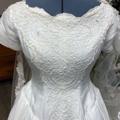 the back of a wedding dress on display