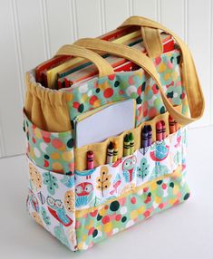 a large bag with many compartments on it