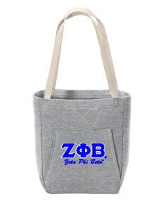 a grey tote bag with purple letters on it