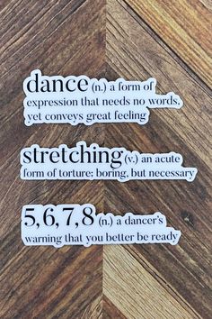 three stickers with words on them that say dance