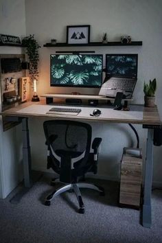 a computer desk with two monitors and a keyboard