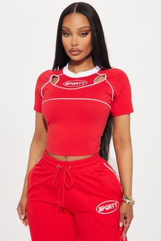 Available In Red And White. Crew Neck Short Sleeve Front Screen Contrast Trim Cut Out Stretch Pair To "Sporty Contrast Wide Leg Pant" Disclaimer: Due To The Printing Process A Difference In Saturation May Occur. Each Garment Is Unique. 95% Cotton 5% Elastane Imported | Sporty Contrast Cut Out Tee Shirt in Red size Small by Fashion Nova Trendy Red Crew Neck Top, Red Crew Neck Trendy Tops, Red Stretch Shirt For Summer, Red Short Sleeve Crop Top For Summer, Red Sporty Crop Top For Spring, Sporty Red Crop Top For Spring, Fitted Red Crew Neck Top, Sporty Red Crop Top With Crew Neck, Sporty Red Shirt For Summer