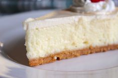 a slice of cheesecake on a white plate