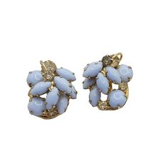 Vintage Verified Juliana Periwinkle Blue Earrings This is a beautiful vintage earrings made in clustered periwinkle blue stone and clear rhinestones in prong set in gold tone metal. This jewelry is verified, confirmed as Juliana. Size: 1.25 inch Condition: Good vintage - 1 clear stone is darker than the other. Signed: Unmarked Please look at all the photos, as they are part of the description. I try my best to point out any flaws. Also please remember this is a preloved piece and may show signs of light wear, marks, scratches, etc. I will be posting a lot more jewelry, Keep checking back. Angel Brooch, Clear Stone, Periwinkle Blue, Blue Earrings, Clear Rhinestones, Remember This, Blue Stone, Gold Tone Metal, Vintage Signs