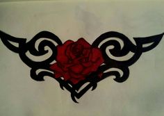 a drawing of a rose with black and red designs on the back of its head