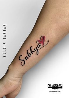 a woman's arm with a tattoo on it that says sulkyo and a heart