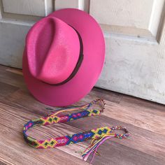 Stay stylish in our wonderfully colorful Mexican straw hats, ideal for any sunny day occasion. Colorful braided headpiece is included, as shown in the picture. Can be used to decorate the hat or just around your head by itself. MADE IN MEXICO By: Mexican Artisans For: Women Size: Large (23.5") Color: Magenta Details: Material: Palm Straw Removable braided yarn headpiece Leather Band Inner elastic band Contact us for more details PLEASE READ BEFORE PURCHASE: The picture is an ACCURATE REPRESENTAT Braided Yarn, Color Magenta, Straw Hats, Sunny Day, Straw Hat, Leather Band, Your Head, Elastic Band, Floppy Hat