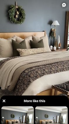 a bed room with a neatly made bed next to a christmas wreath on the wall