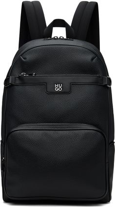 Grained faux-leather backpack in black. · Carry handle · Adjustable padded shoulder straps · Logo hardware and D-rings at face · Zip pocket · Luggage strap at padded back face · Zip compartment · Two-way zip closure · Two compartment interior · Laptop compartment at interior · Logo-woven satin lining · Logo-engraved gunmetal-tone hardware · H17 x W11 x D9 Supplier color: Black On-the-go Backpack With Gunmetal Hardware, Black Backpack With Gunmetal Hardware For Travel, Black Travel Backpack With Gunmetal Hardware, Leather Backpack With Branded Hardware For Daily Use, Black Backpack With Gunmetal Hardware, Black Backpack With Gunmetal Hardware For Daily Use, Everyday Leather Backpack With Branded Hardware, Everyday Backpack With Branded Hardware, Black Backpack With Branded Hardware