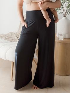 The postpartum & maternity lounge pants you never knew you needed but you can’t live without. High-waisted and super-flattering, these wide-leg lounge pants are perfect whether you’re pregnant, postpartum, or beyond. They’re made from our stretchy, breathable, buttery-soft bamboo fabric, and they’ve got a wide, gentle waistband that accommodates your changing body. With a versatile style you can dress up or down and convenient pockets, these comfortable maternity pants will be your new go-to for lounging, running errands, sleeping, and so much more. Trust us, you’ll want more than one pair.  Full-length, wide-leg cut Temperature-regulating, moisture-wicking jersey fabric Perfect for pregnancy or postpartum Wear over bump while pregnant Wear at waist postpartum Postpartum Pants, Maternity Joggers, Kindred Bravely, Delivery Gown, Post Partum Outfits, Wide Leg Lounge Pants, Maternity Pajamas, Lounge Pants Womens, Maternity Pants