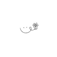 a black and white drawing of a smiley face with a flower on it's nose