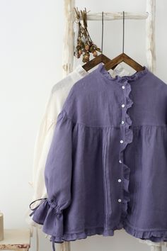 "This is a new-made linen blouse. Fully edged with lace. The sleeves is specially designed. Cuff tied with bow tie. Cute and romantic. Made of 100% nature linen. There are 2 colors available, white and bluish violet. Measures approximately (Loose type, suitable for all body types): 1/2 Bust: 80cm (31.5\") Length: 65cm (25.6\") Shoulder to Shoulder: 57cm (22.44\") ruffle Sleeve: 43cm (17\") There may be 1-2cm measurement margin. ---------------------------------------- Linen is a washable fabric, Violet Vintage, Cotton Tops Designs, Neat Casual Outfits, Fancy Shirt, Mode Kimono, Women Blouses Fashion, Hijabi Fashion Casual, Modest Dresses Casual, Casual Day Outfits