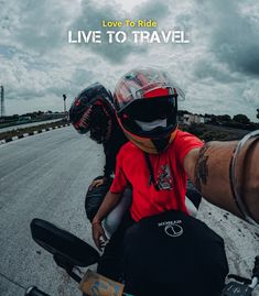 two people riding on the back of a motorcycle