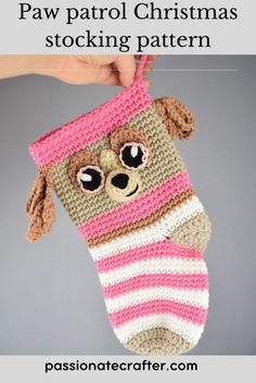 a crocheted stocking with a dog on it and the words paw patrol christmas stockings