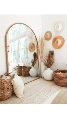 a mirror and some baskets in a room