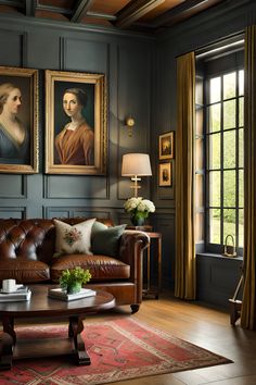 a living room with two paintings on the wall and leather couches in front of them