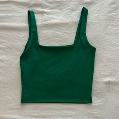 Size Small! Square Neck, Stretchy Material, Beautiful Green Color! Never Worn! Green Stretch Tank Top For Day Out, Trendy Green Crop Top For Everyday, Fitted Green Crop Top For Everyday, Green Cropped Top For Everyday Wear, Green Crop Top For Summer, Green Fitted Trendy Tank Top, Green Cropped Top For Everyday, Fitted Green Tank Top For Everyday, Green Elastane Summer Tops