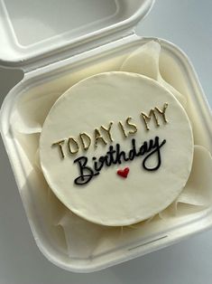 a birthday cake with the words today is my birthday on it in a plastic container