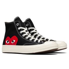 The iconic collaboration between Converse and Comme Des Garçons PLAY continues with the All Star Chuck ‘70 Hi. The traditional Converse silhouette features the signature bug-eyed red heart motif throughout the exterior. The silhouette is complete with a full-lace closure, and a rubber toebox and outsole for extended durability. CHUCK TAYLORS RUN ABOUT 1/2 SIZE LARGE, WE RECOMMEND SIZING DOWN. THIS PRODUCT DOES NOT QUALIFY FOR ANY DISCOUNTS OR SPECIAL PROMOTIONS. Canvas upper Printed CDG heart lo Converse Chuck 70 Vintage Black, Star Converse Low Rise, Haert Converse, Bape Heart Converse, Converse Heart Shoes Grey, Commo De Garcon Converse, Heart Me Converse, Heart Eyes Converse, Converse Chuck Taylor All-star 70s Hi Comme Des Garcons Play Multi-heart White