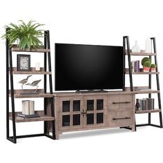 an entertainment center with shelves and a flat screen tv