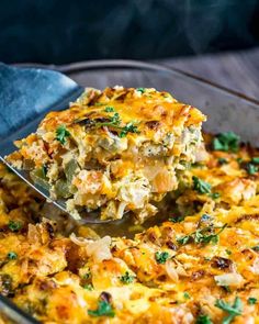 a close up of a spoon in a casserole