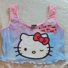 Brand New With Tags. Size 0xl Like A 12/14. Fits A Little On The Tight Side. Y2k Sleeveless Top With Hello Kitty Print, Sleeveless Hello Kitty Print Top, Fitted Hello Kitty Top For Spring, Fitted Hello Kitty Tops For Spring, Spring Fitted Hello Kitty Tops, Blue Cat Print Tops For Summer, Blue Cat Print Summer Tops, Hello Kitty Y2k Summer Top, Hello Kitty Print Stretch Top For Summer