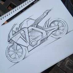 a pencil drawing of a motorcycle on paper