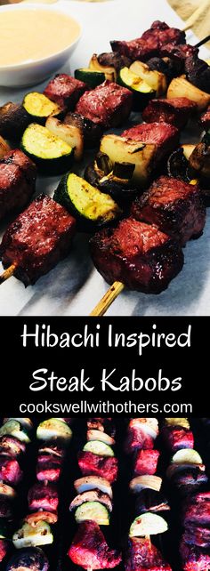 grilled steak kabobs on skewers with dipping sauce