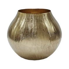 a gold vase with wavy lines on it