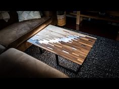 a coffee table made out of wood and metal