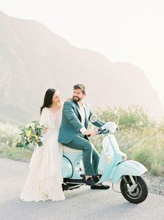 a bride and groom are sitting on a scooter