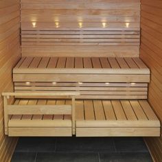 the inside of a sauna with wooden benches