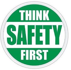 a green and white sticker that says think safety first