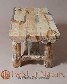 a wooden stool made out of logs with the words twist of nature written below it