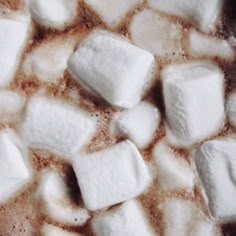 there are many pieces of marshmallows on the table