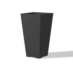 a tall black vase sitting on top of a white floor