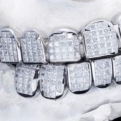 ICECARTEL exclusive Invisible Set Princess Cut Moissanite Diamond Grillz are now available, made of 925 sterling silver and PVD plated with a thick layer of 14K Gold. These 8 on 8 moissanite grillz are iced out with princess cut colorless (D-Color), VVS moissanite flawless diamonds. All of the diamonds on these moissanite grillz pass the diamond tester. These moissanite grillz are custom-made for every order. Please allow 3-4 weeks for manufacturing. We can customize these grillz any way you wan Silver Diamond Cut Moissanite Jewelry, Luxury Silver Jewelry With Prong Setting, Luxury Silver Jewelry With Lab Grown Diamonds, Luxury Lab Grown Diamond Jewelry, Iced Sterling Silver Jewelry In Diamond White, Iced Diamond Gold Jewelry, Luxury Silver Moissanite Jewelry, Silver Jewelry With Prong Setting And Lab Grown Diamonds, Luxury Silver Diamond Cut Jewelry