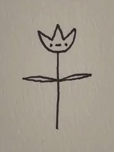 a drawing of a cross with a crown on it