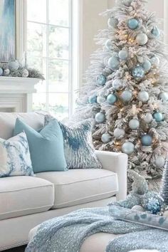 29 Blue Christmas Tree Ideas: Bringing Winter Magic Into Your Home - ReenaSidhu Winter Wonderland Christmas House Decor, Frozen Inspired Christmas Tree, Soft Blue Christmas Decor, Winter Wonderland Tree Decorations, Icy Blue Christmas Decor, How To Style A Christmas Tree, Frosty Christmas Decor, Coastal Christmas Decorating Ideas, Icy Blue Christmas Tree