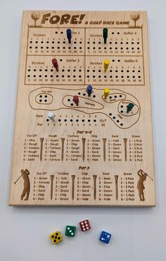 a wooden board game with dices and numbers on it