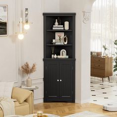 a living room with a black bookcase in the corner