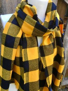 "Plaid Scarf in straight or infinity The Buffalo Plaid Scarf is a classic look for Fall. It's wonderful bright yellow and Black really add flare to any outfit. The fabric is a bit thicker then other plaids in my collection. It's amazing soft cotton, very high end fabric. I put a lot of care into hand fringing all the edges. This lovely scarf is allcotton and can go in the wash. I pick all my fabrics for their beauty and quality. It's a medium weight and yarn dyed just perfect for Fall/Winter Thi Yellow Winter Scarves, Casual Yellow Scarf For Winter, Casual Yellow Winter Scarf, Cotton Scarves For Fall, Buffalo Plaid Scarf, Emily May, Boulder Co, Fall Scarves, The Buffalo