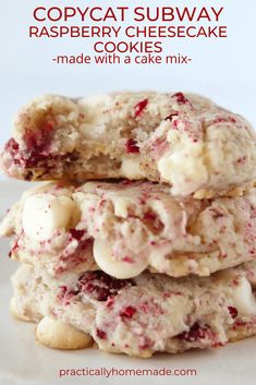 three cookies stacked on top of each other with white chocolate chips and cranberries