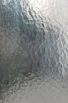 an abstract silver background that looks like it has been painted