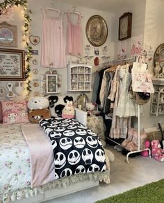 a bedroom decorated in pink, white and black