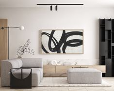 a modern living room with black and white decor